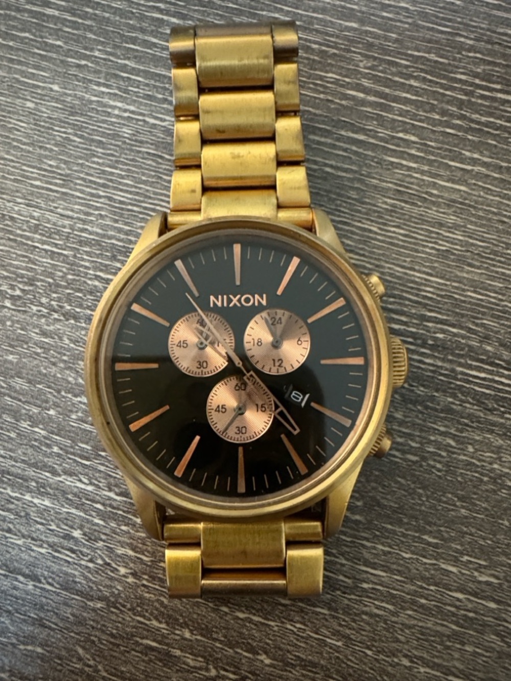 Nixon Gold and Black Chronograph Watch